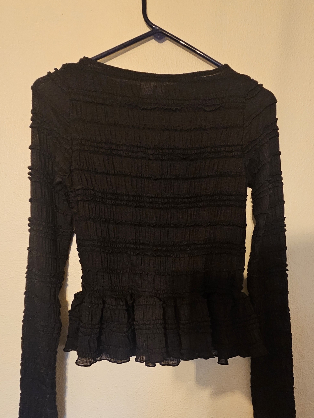 Divided Black Long-Sleeve Ruffle Peplum Top